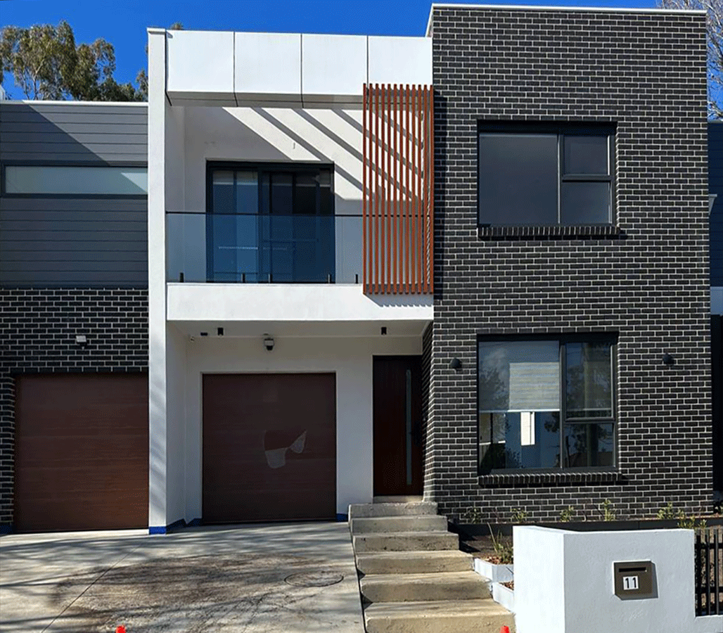 Aluminum facade cladding and custom cassette installation for a project in West Ryde by I Window Glazing.